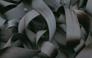 A close up view of a pile of seatbelts