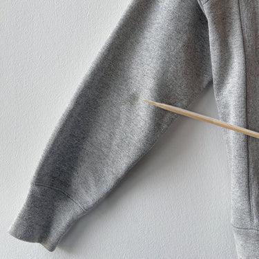 Gray sweater on a white background