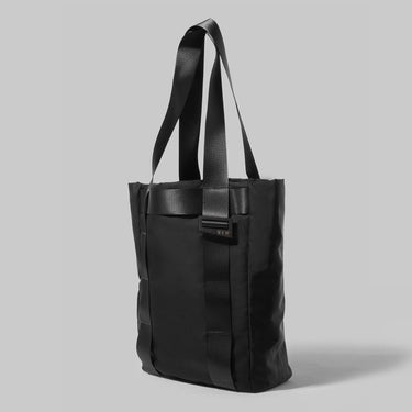 Black tote bag made with recycled car seatbelt straps