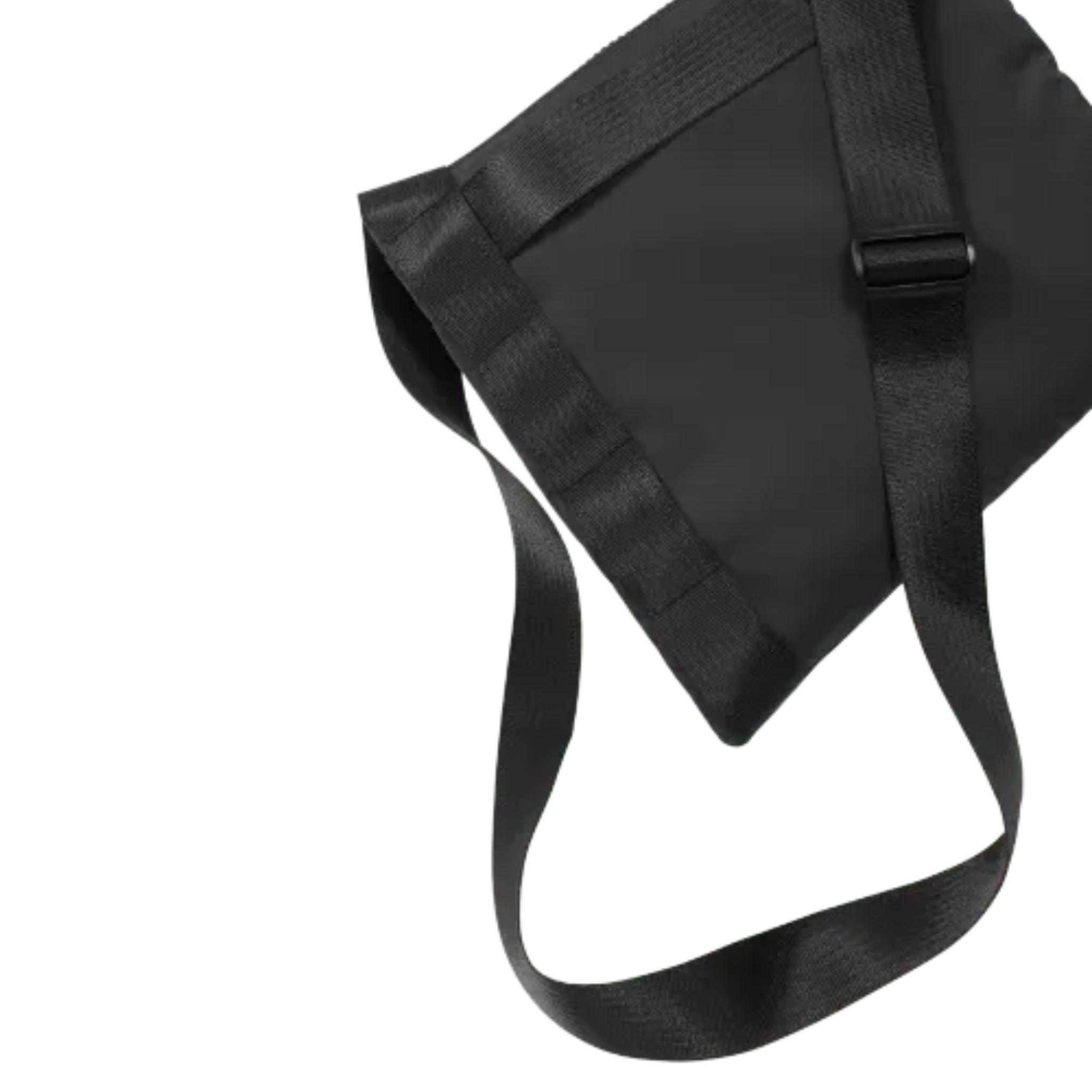 Close up of the ANDO satchel in black upcycled fishnets (econyl). Product shown at the front/center of a white background