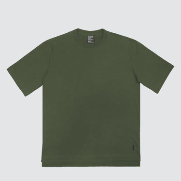 A green japandi-style t-shirt with 1/3 length sleeves and a step-change between the front and back bottom