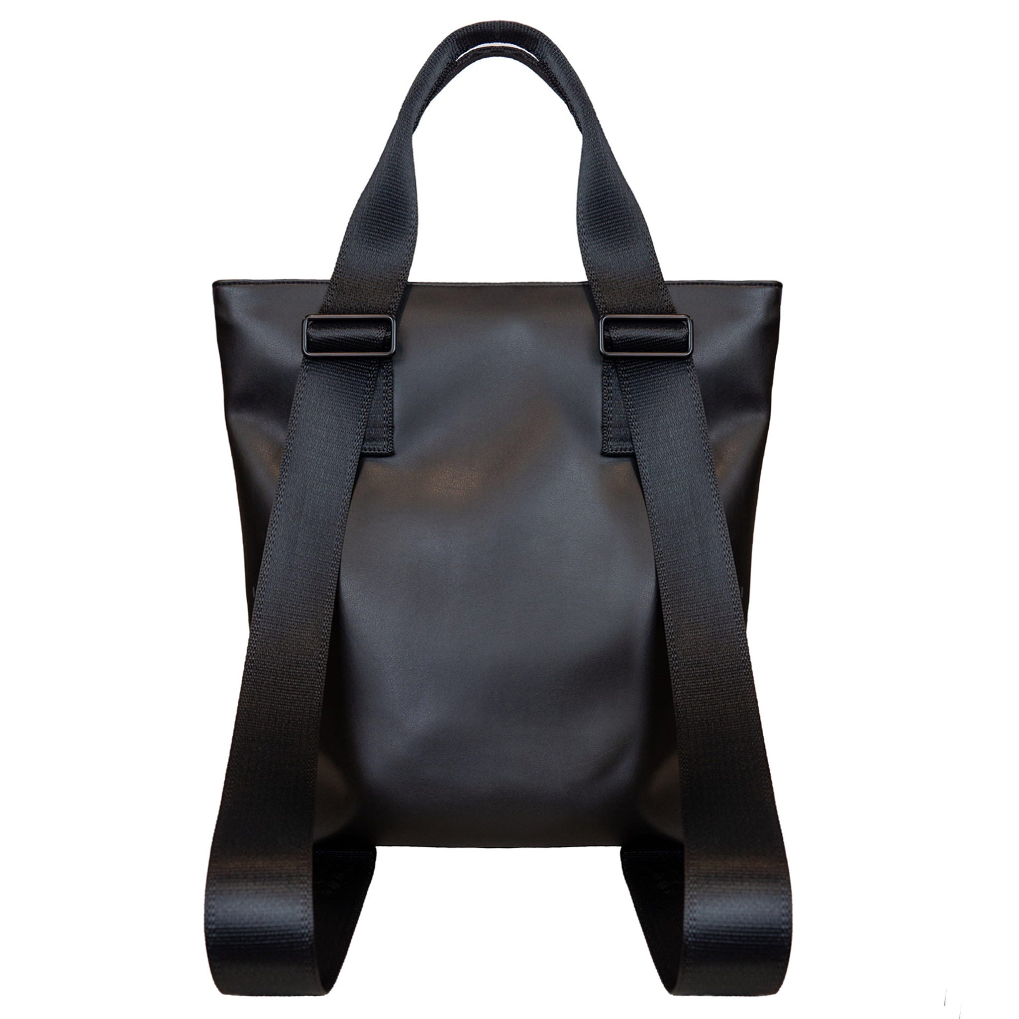 Back view of a totepack made with black vegan leather. The convertible strap is extended to show the backpack option