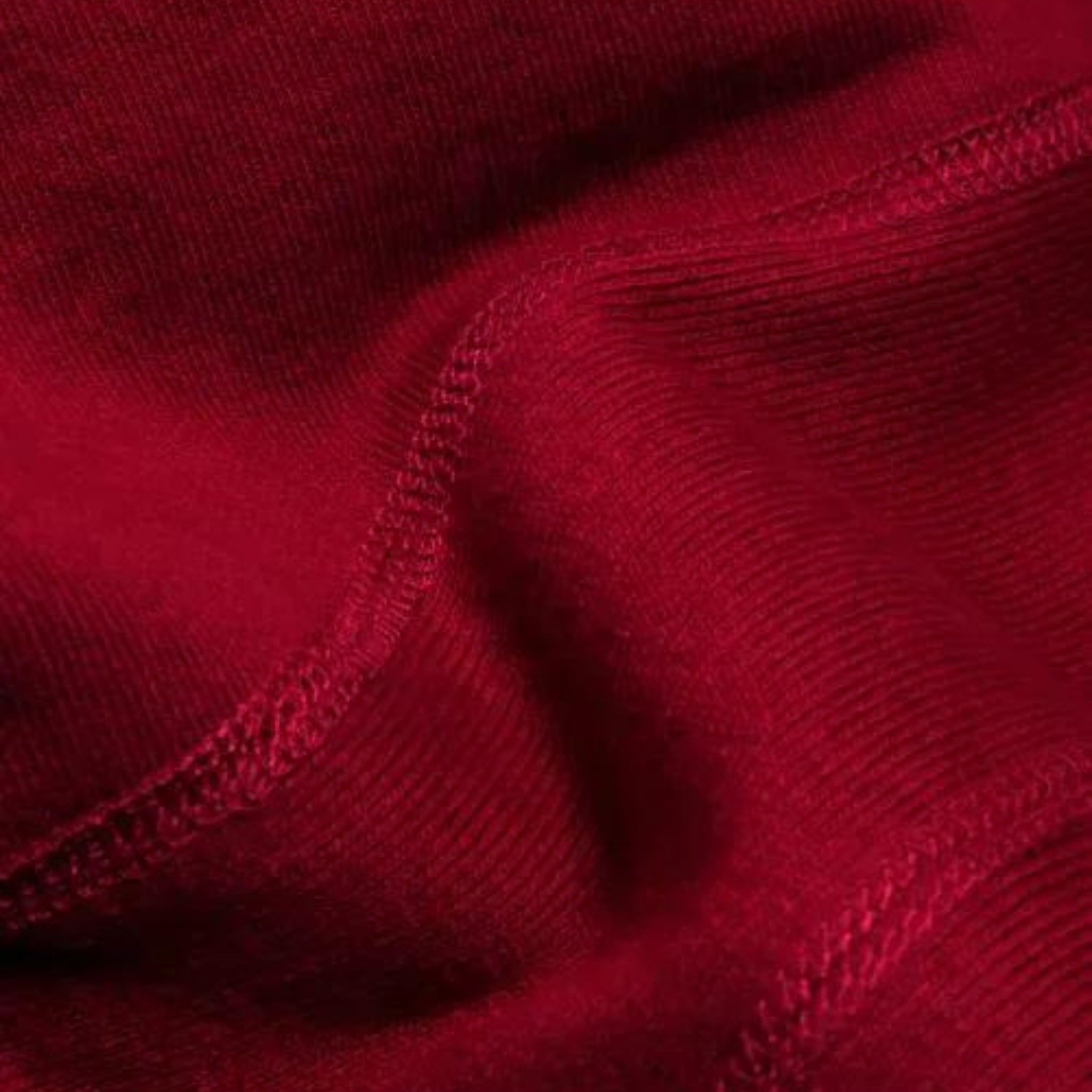 knit detail of heavyweight crewneck in 100% red cotton.