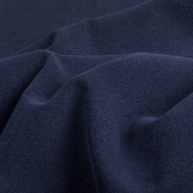 close up detail of a 100% cotton t-shirt in the colour navy