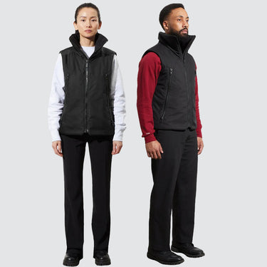 A male and a female model stand wearing the same unisex black vest