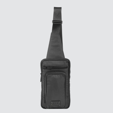 Face view of a utilitarian style sling in graphite upcycled nylon material on a white background.