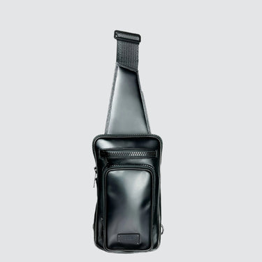 The front of a sling in black upcycled leather with a sleek finish on a white background.