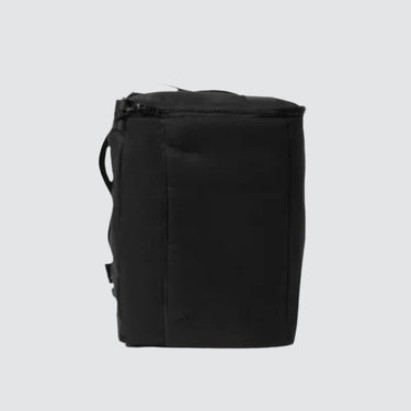 Interesting rectangular shaped backpack in upcycled material on a white background.