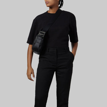 goodall black handheld on model with grey background