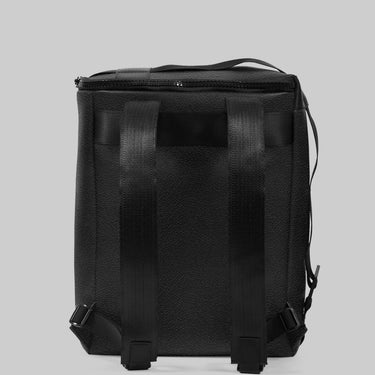 Black backpack on a light gray background