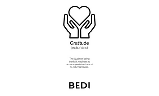 Image depicting the definition of Gratitude, above it sits an icon representing it (a heart inside of two hands) in black in front of a white background.