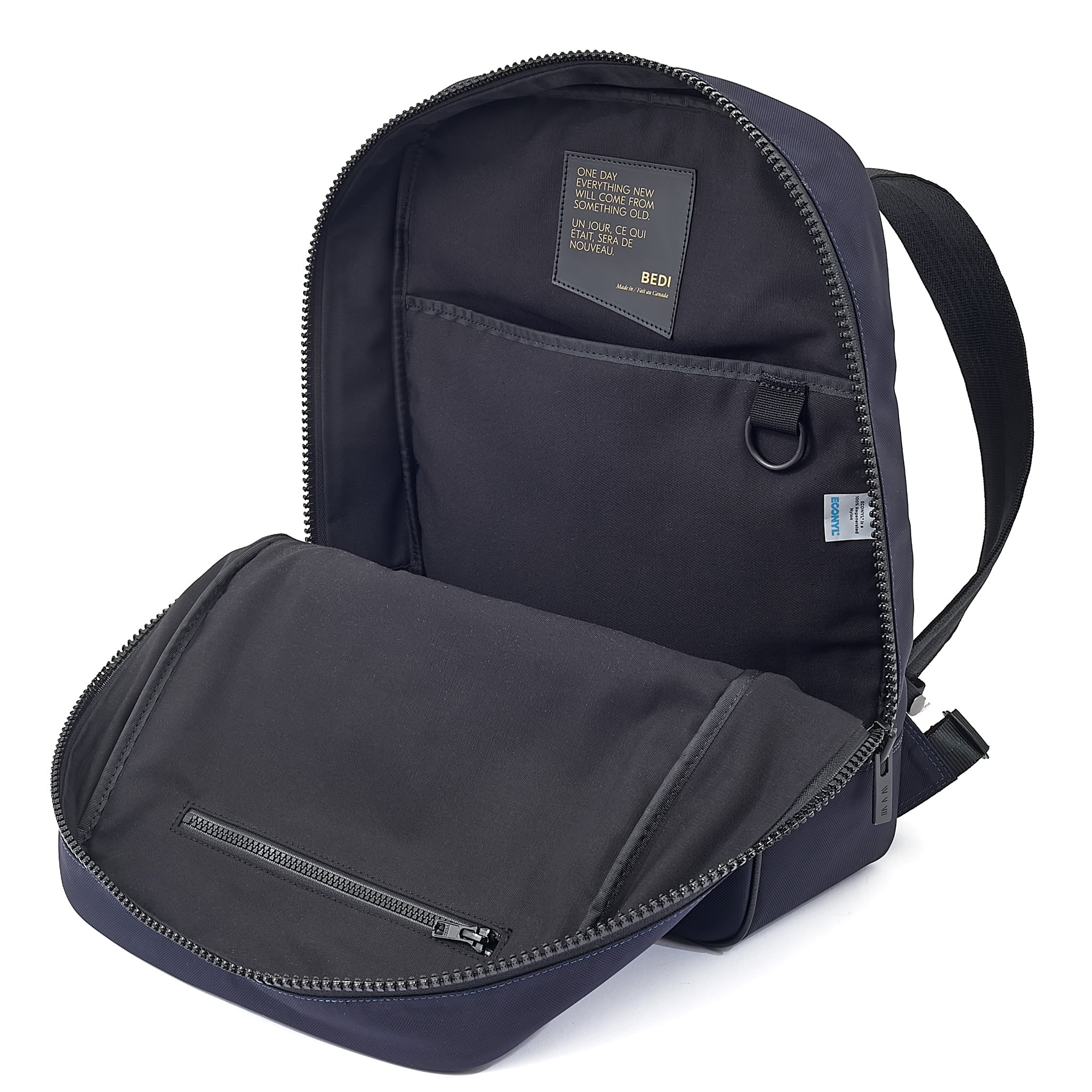 Navy CHE backpack in econyl open side view in front of a white background