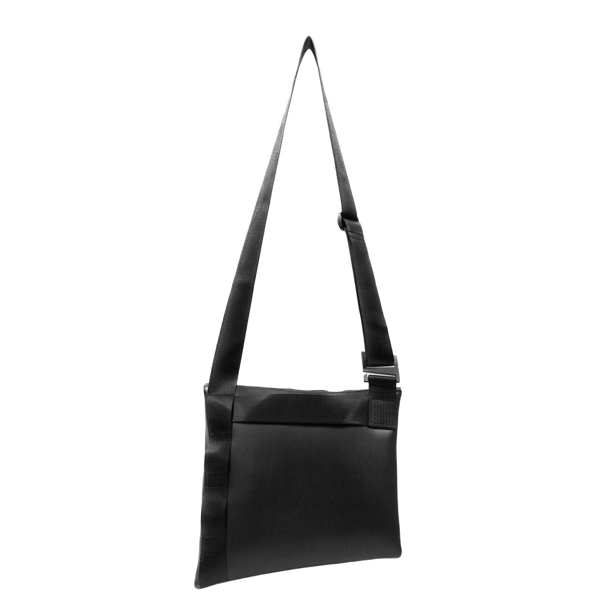 The back of The ANDO satchel in black vegan leather (desserto). Product shown at the front/center of a white background