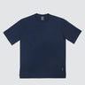 A japandi-style t-shirt in navy cotton,with 1/3 length sleeves and a step-change between the front and back bottom
