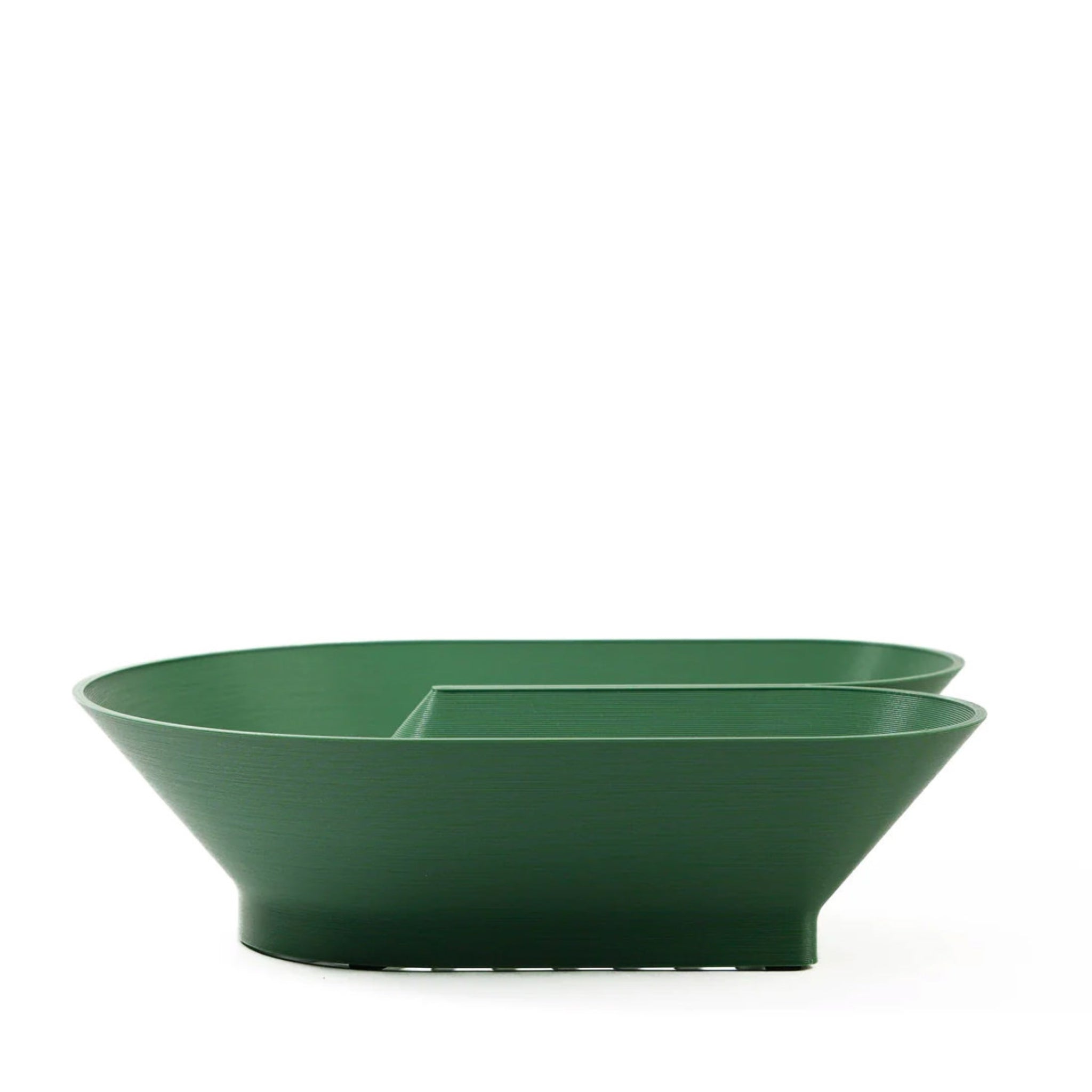 Cyrc U fruit bowl in evergreen. 3D printed recycled plastic. Product placed in front of a white background