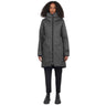 Female stands facing camera wearing a graphite parka on a white background