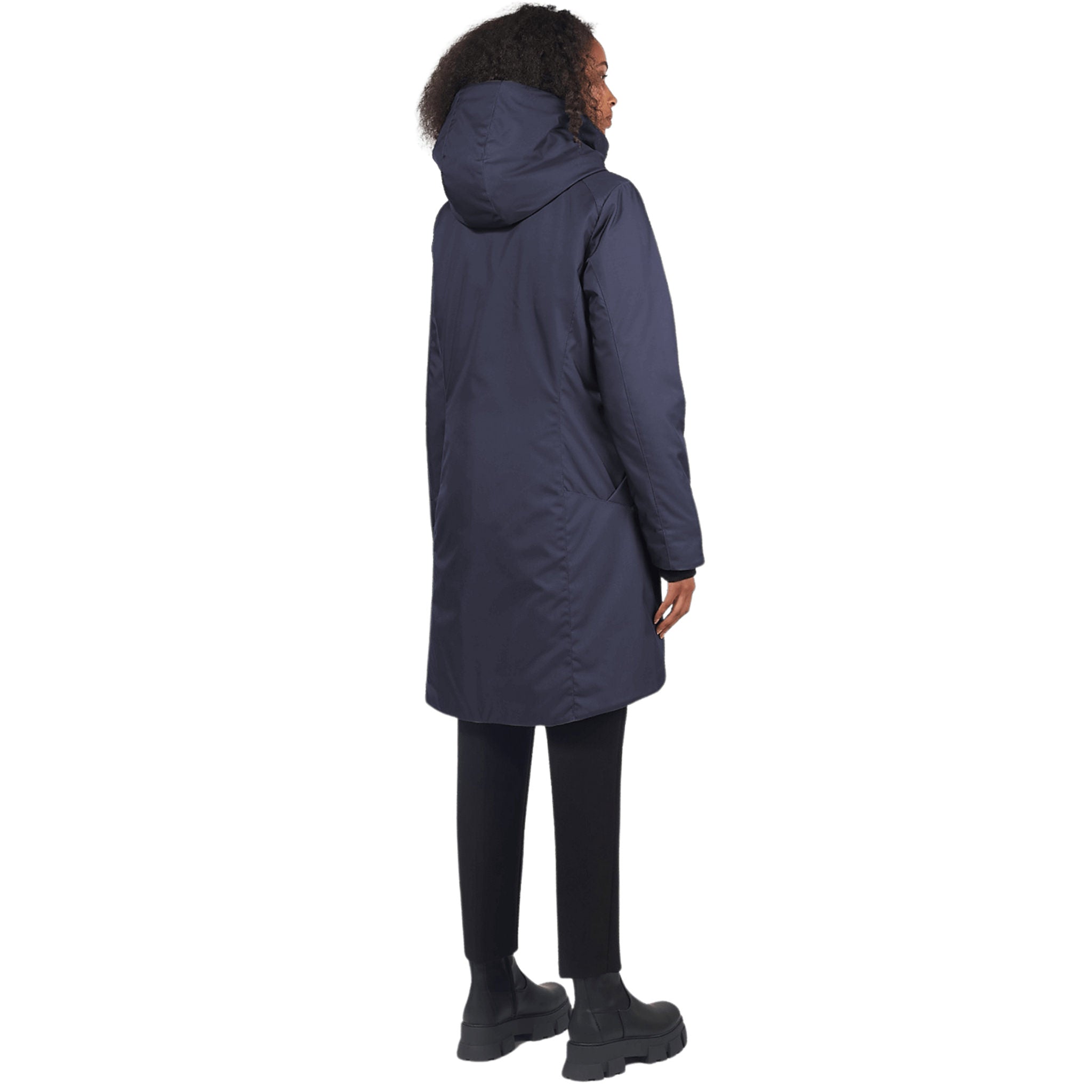 Back view of a female model wearing a navy, knee-length coat with a high neck