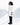A woman standing in a knee-length white winter coat with a snowy background
