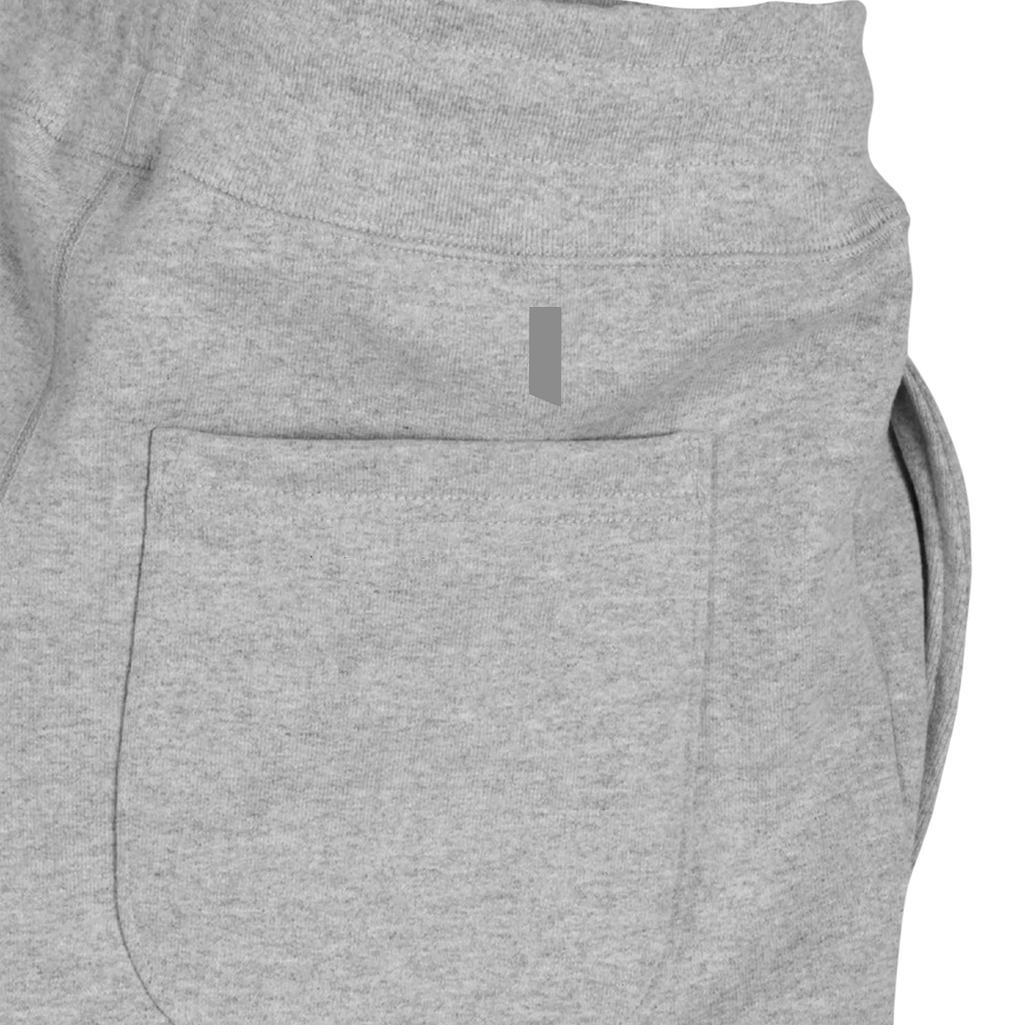 pocket detail view of grey heavyweight knit joggers against white background