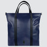 A medium sized navy blue leather tote bag, made with sustainable materials