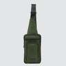 Front view of a utilitarian style sling in green upcycled nylon material on a white background