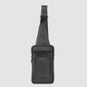 Face view of a utilitarian style sling in graphite upcycled nylon material on a white background.