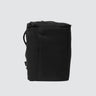Interesting rectangular shaped backpack in upcycled material on a white background.