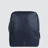 A navy blue leather backpack with a zip pocket in the front, and a briefcase-style handle on the side