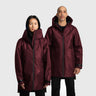 A male and a female model wearing red raincoats on a white background