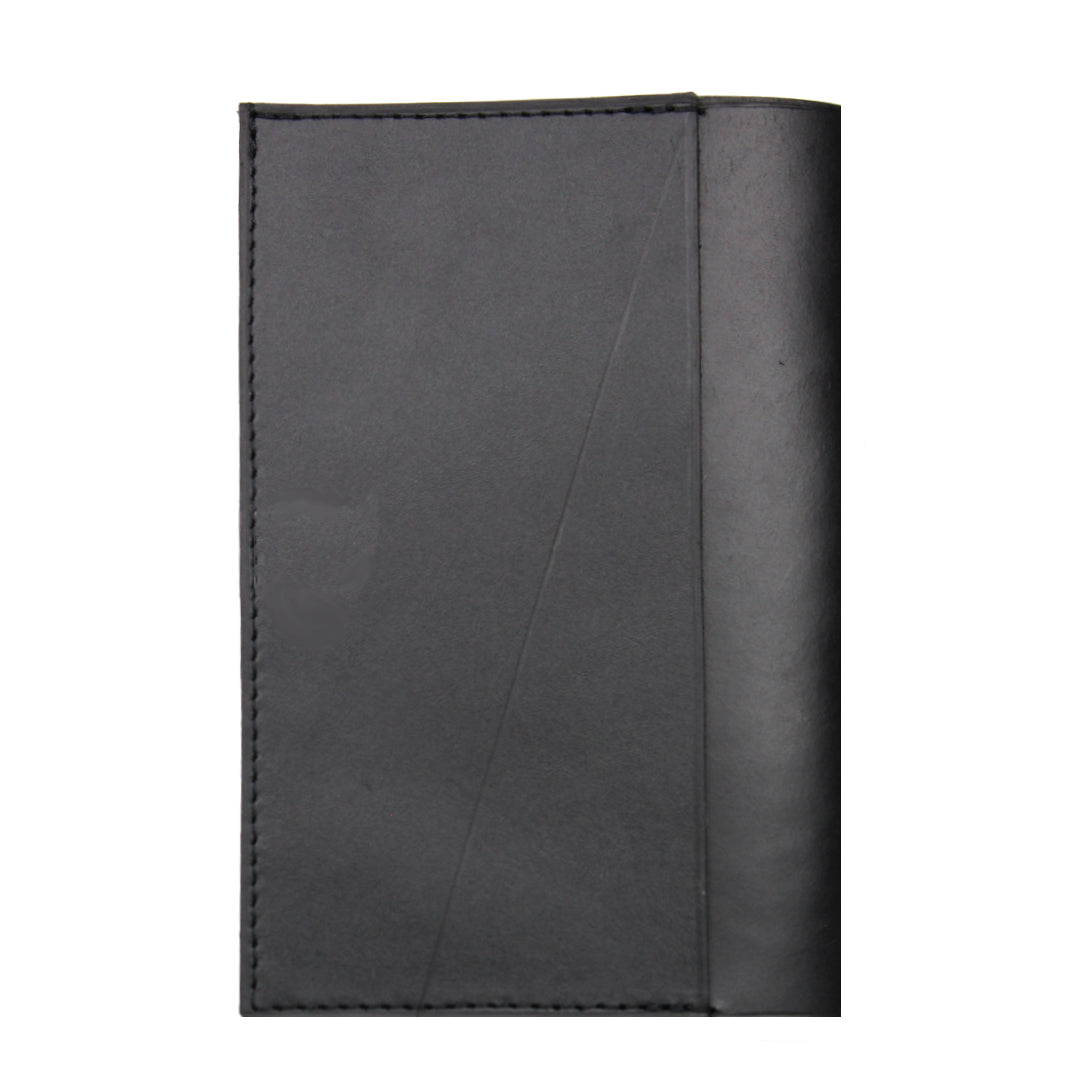 Back view of minimalist passport wallet in black upcycled leather