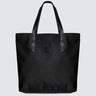 a black nylon tote bag on a white background