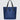 A blue nylon tote bag with black medium-length straps and a black patch with gold logo text