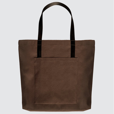 back view of a brown tote bag with large exterior pocket