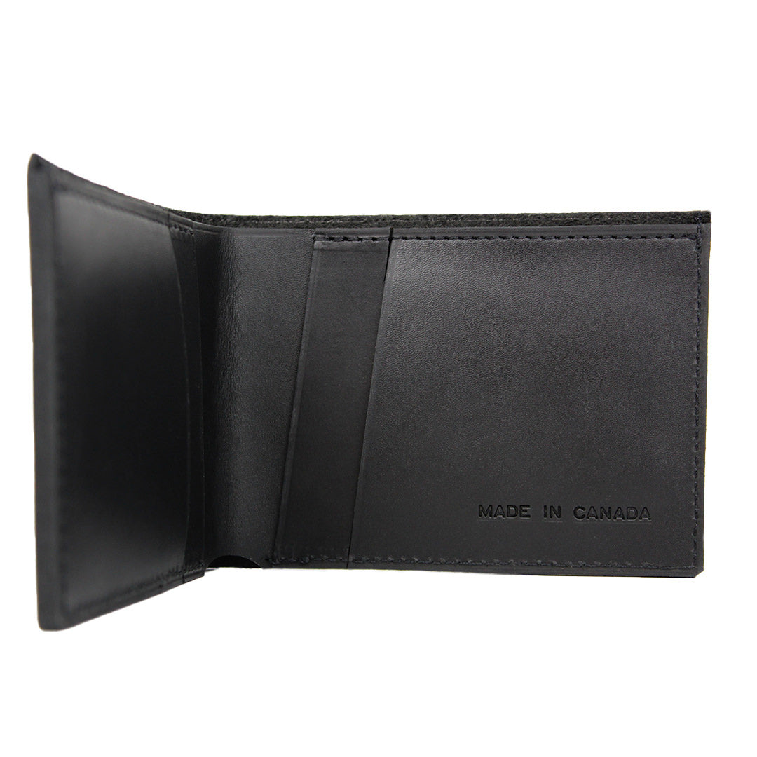 Interior of Bedi's classic black leather wallet, with four card slots