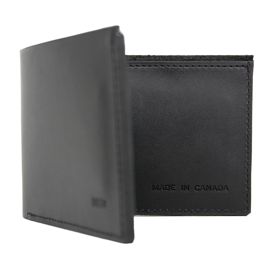 Detailed close up of Bedi's black leather wallet, showing the "made in Canada" embossed text
